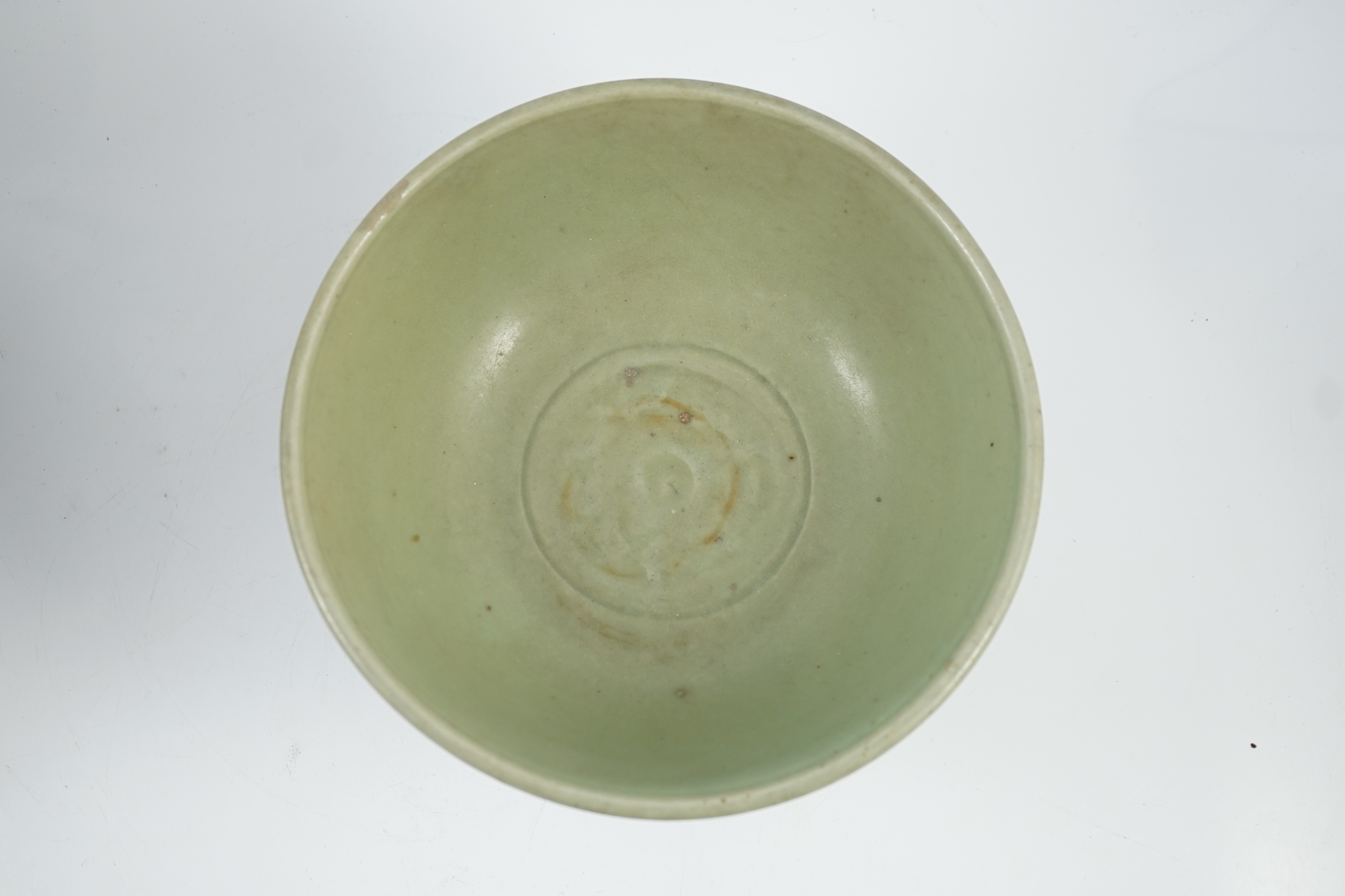 A Chinese Ming Longquan celadon bowl, 15th century, glaze scratched